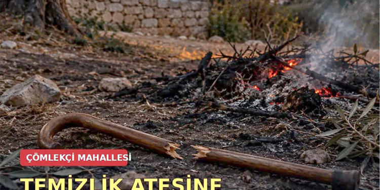 Yerde kırılmış bir baston ve arkada yanan temizlik ateşi.