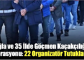 Polis eşliğinde yürütülen göçmen kaçakçılığı operasyonundan bir kare.
